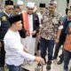 Haris Kelana Damanik saat meletakkan batu pertama pembangunan tahap 2 Pondok Pesantren Al Muflihun di Kampung Sialang Muda Desa Klambir Kecamatan Hamparan Perak, Minggu (26-11-2023). (seputaranindonesia.com/istimewa)