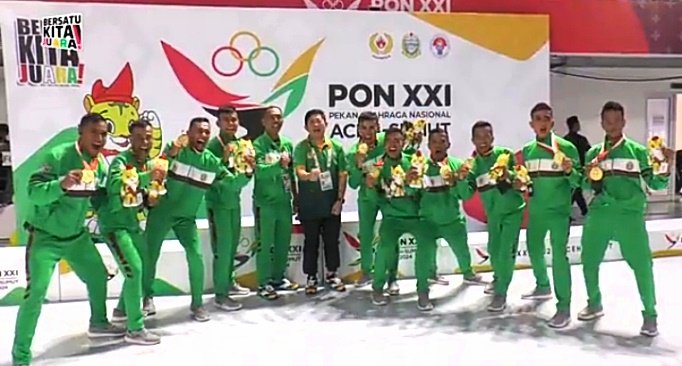 Tim barongsai Sumatera Utara (Sumut) berhasil meraih emas dalam nomor pertandingan naga kecepatan pada Pekan Olahraga Nasional (PON) XXI Aceh-Sumut, di Gedung Martial Art, Sport Center Provinsi Sumut, Deli Serdang, pada Rabu (4/9) pagi. (seputaranindonesia.com/Istimewa)